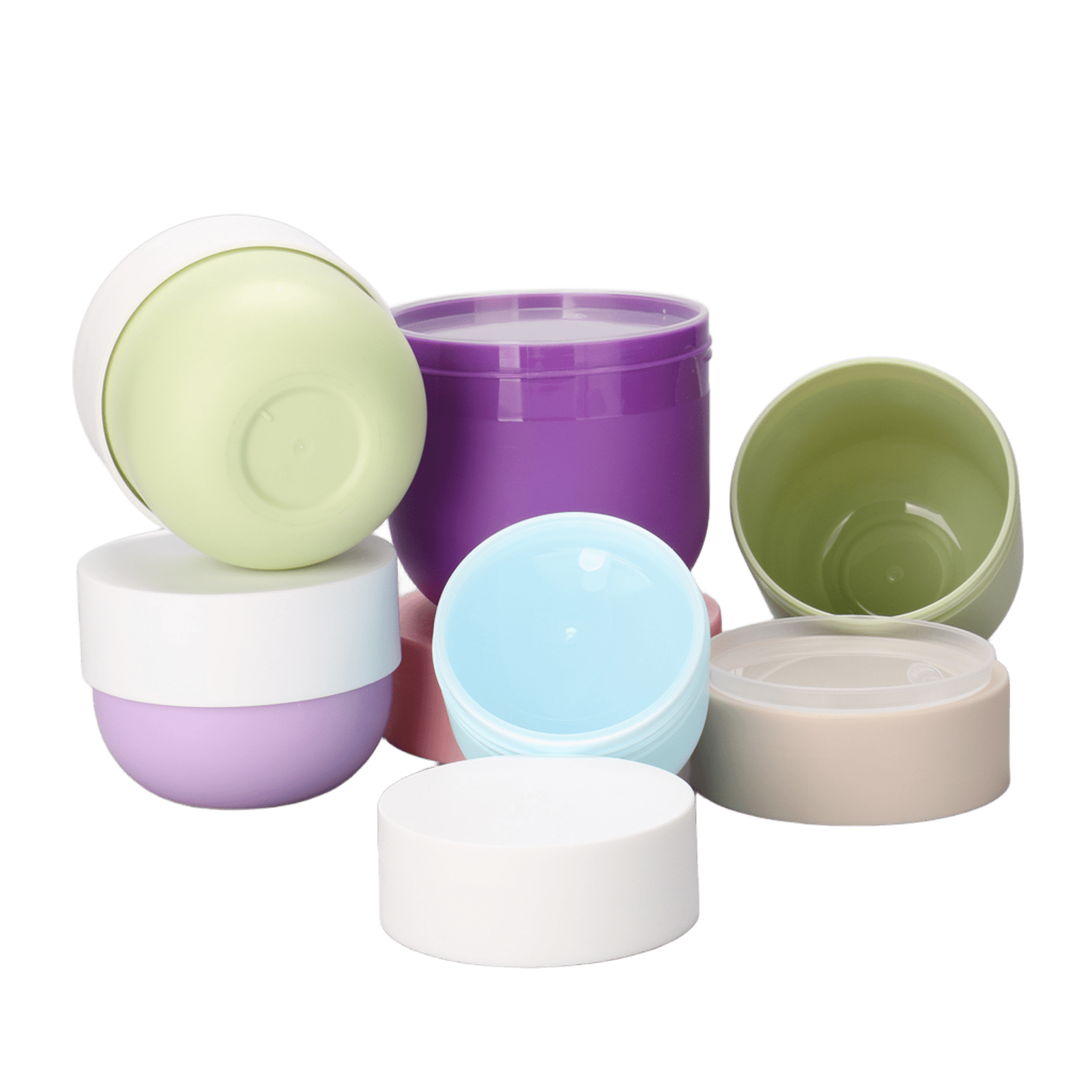 Assorted face cream jars on a marble surface