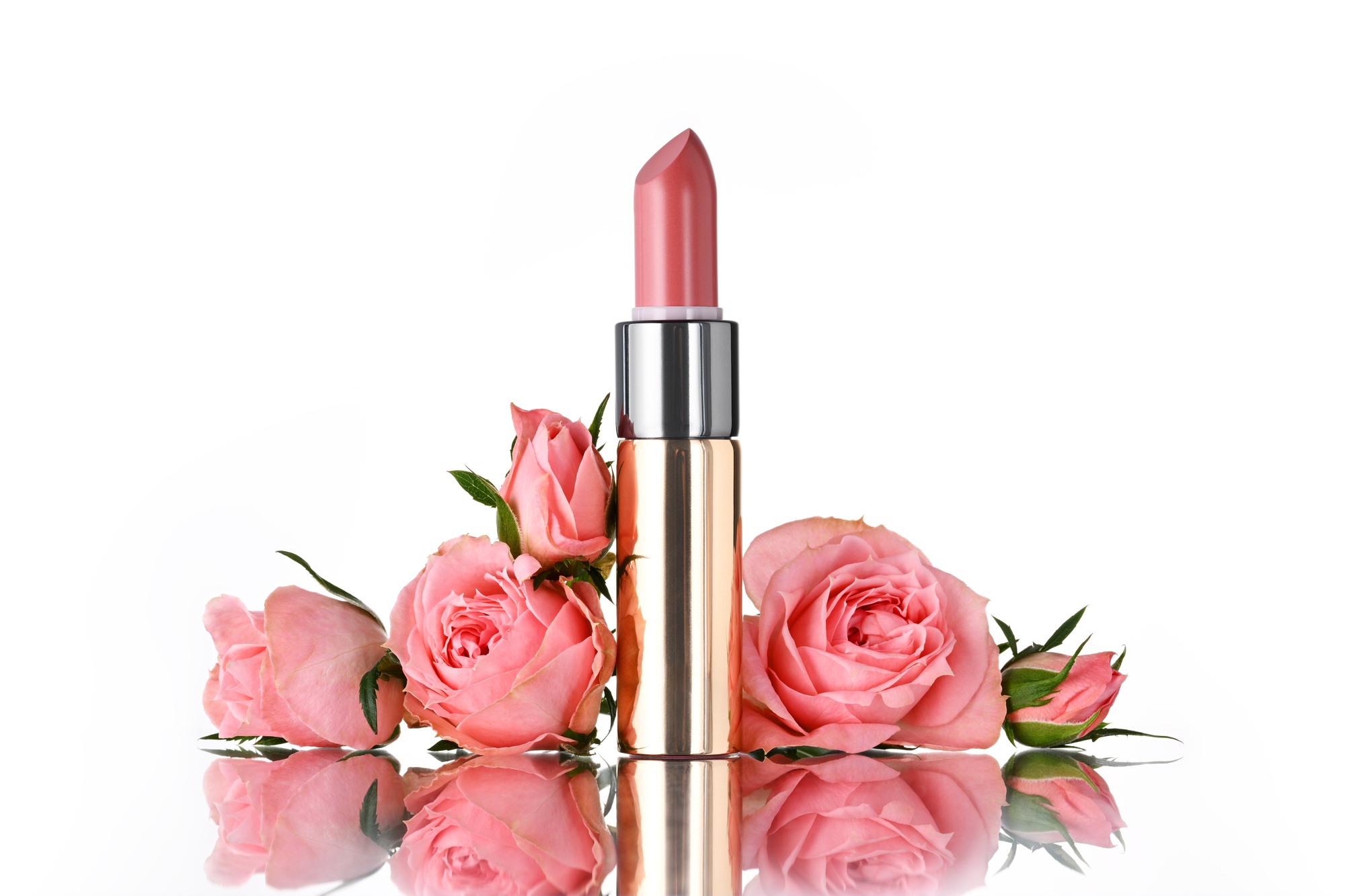 Assorted metal tins and cylinders for beauty items
